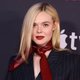 Elle Fanning Dazzles in Tassel-Adorned Cone Bra for Her Bold Role
