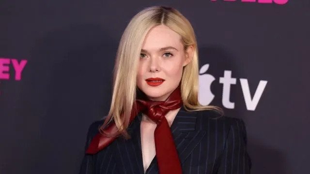 Elle Fanning Dazzles in Tassel-Adorned Cone Bra for Her Bold Role