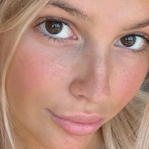 Emily Trapp Embraces Freedom with Bikini Top Removal in Sun-Kissed Video