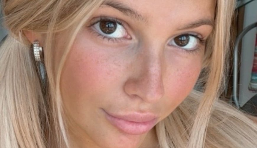 Emily Trapp Embraces Freedom with Bikini Top Removal in Sun-Kissed Video